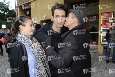 Tom Tykwer mit Frerundin Marie Steinmann, Benno Fürmann