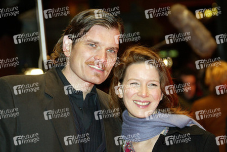 Götz Otto mit Partnerin