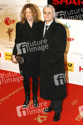 Henry Hübchen mit Partnerin