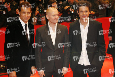 Clive Owen, Ulrich Thomson, Tom Tykwer