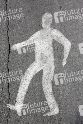 Figur auf Asphalt