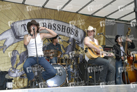 Alec 'Boss Burns' Völkel, Ansgar 'Frank Doe' Freyberg, Sascha 'Hoss Powers' Vollmer, André 'Guss Brooks' Neumann (The BossHoss)