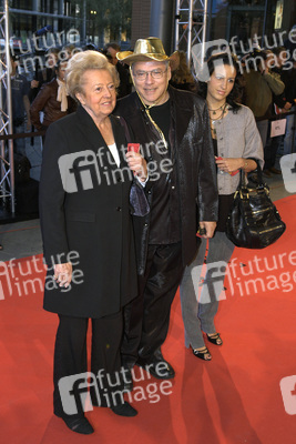 Rosa von Praunheim mit Begleitung