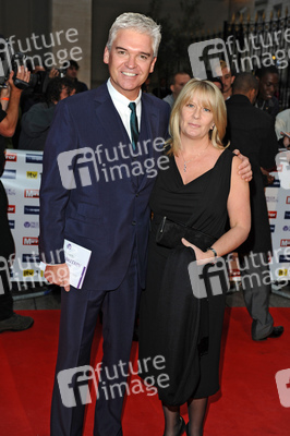 Phillip Schofield mit Begleitung