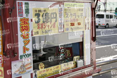 Maneki Neko in Lottoannahmestelle