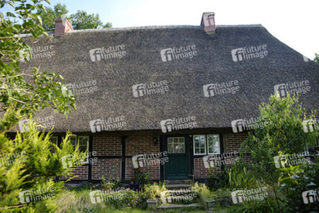 Bauernhaus mit Reitdach