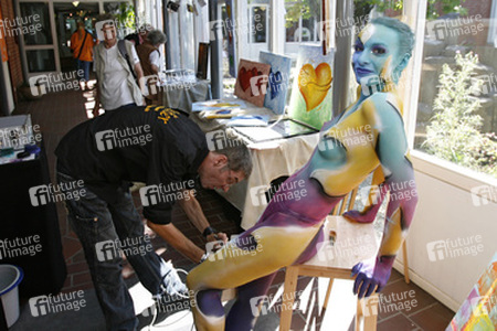 Jörg Düsterwald mit Model Sarah