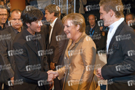 Joachim 'Jogi' Löw, Angela Merkel, Bastian Schweinsteiger