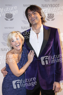 Marcus Schenkenberg mit Begleitung