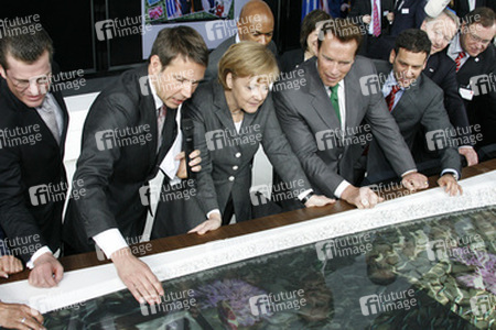 Karl-Theodor zu Guttenberg, René Obermann, Angela Merkel, Arnold Schwarzenegger