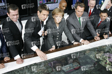 Karl-Theodor zu Guttenberg, René Obermann, Angela Merkel, Arnold Schwarzenegger