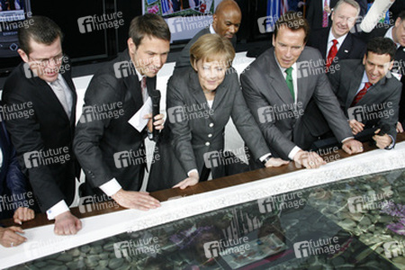 Karl-Theodor zu Guttenberg, René Obermann, Angela Merkel, Arnold Schwarzenegger
