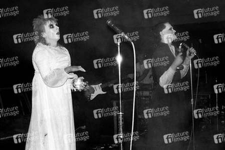 Guggi (Derek Rowan), Gavin Friday