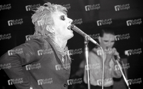 Guggi (Derek Rowan), Gavin Friday