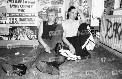 Guggi (Derek Rowan), Gavin Friday