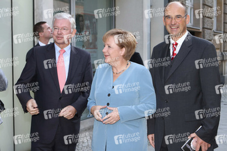 Roland Koch, Angela Merkel, Manuel Herder