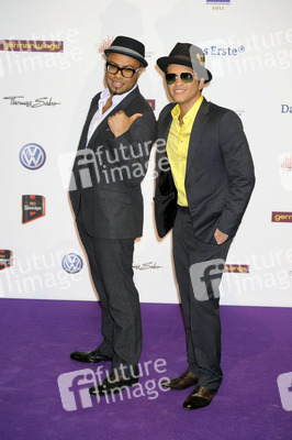 Bruno Mars mit Begleitung