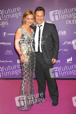 Guido Maria Kretschmer mit Begleitung