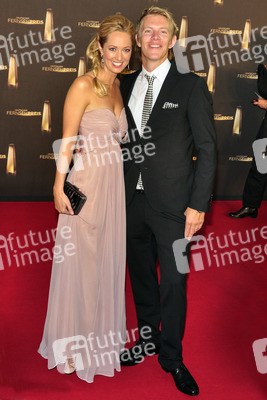 Simon Gosejohann mit Begleitung