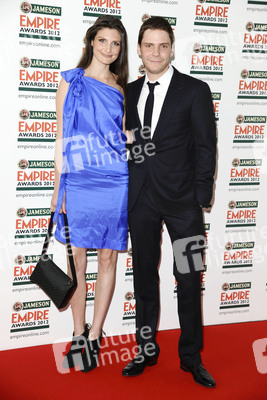 Daniel Brühl mit Begleitung