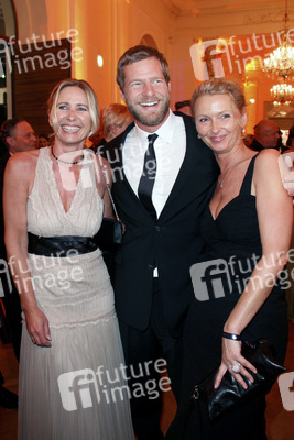 Henning Baum mit Frau Corinna und Gast