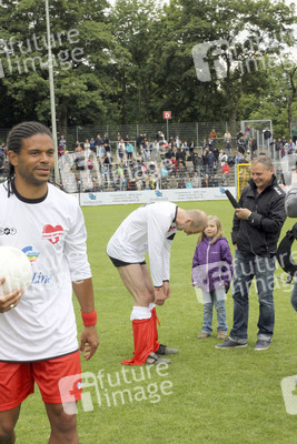 Michél Mazingu-Dinzey, Peter Lohmeyer