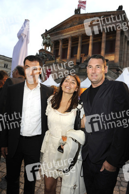 Cem Özdemir mit Gattin Pia Castro, Michael Michalsky