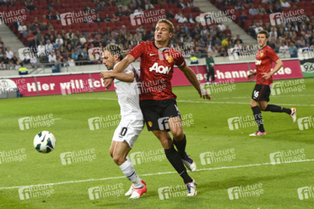 Szabolcs Huszti, Nemanja Vidic, Michael Carrick