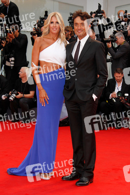 Tiziana Rocca, Giulio Base