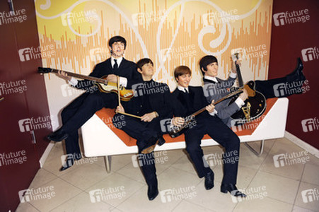 Wachsfiguren von Paul McCartney, Ringo Starr, John Lennon und George Harrison (The Beatles)