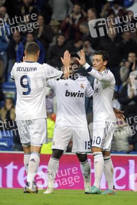 Karim Benzema, Mesut Özil, Michael Essien