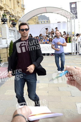 Hugh Jackman Signs Autographs at the San Sebastian Film Festival 2013