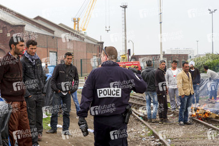 Flüchtlinge im Flüchtlingslager in Calais