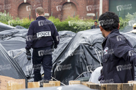Flüchtlinge im Flüchtlingslager in Calais