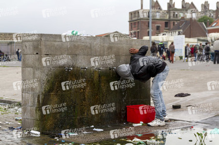 Flüchtlinge im Flüchtlingslager in Calais