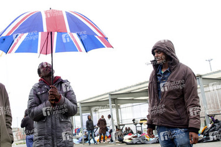 Flüchtlinge im Flüchtlingslager in Calais