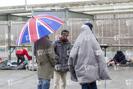 Flüchtlinge im Flüchtlingslager in Calais
