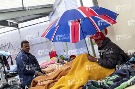 Flüchtlinge im Flüchtlingslager in Calais