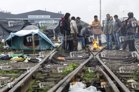 Flüchtlinge im Flüchtlingslager in Calais