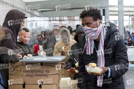 Flüchtlinge im Flüchtlingslager in Calais
