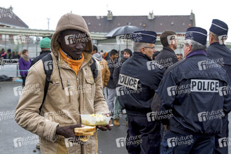 Flüchtlinge im Flüchtlingslager in Calais