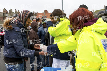 Flüchtlinge im Flüchtlingslager in Calais