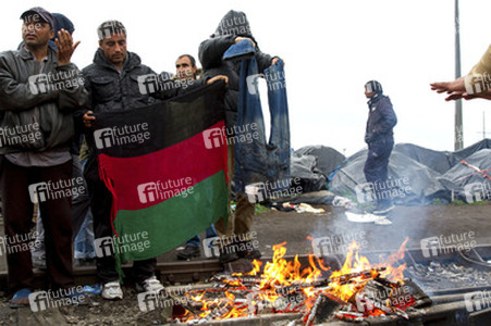 Flüchtlinge im Flüchtlingslager in Calais