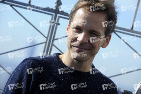 Peter Sarsgaard beleuchtet Empire State Building rot, New York