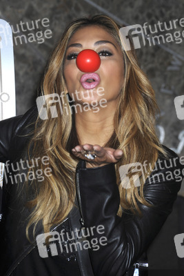 Nicole Scherzinger beleuchtet das Empire State Building in New York