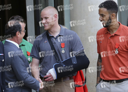 French President Francois Hollande Receives Train Attack Heroes At Elysee Palace
