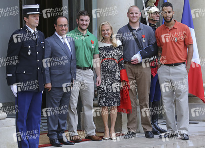 French President Francois Hollande Receives Train Attack Heroes At Elysee Palace