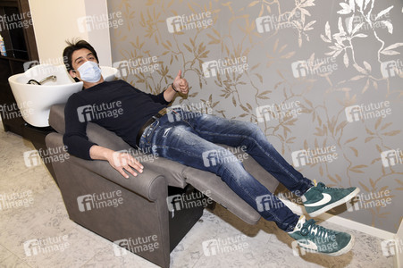 Friseurbesuch von Adrian Can in München