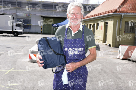 Spendenaktion mit Paul Breitner in München