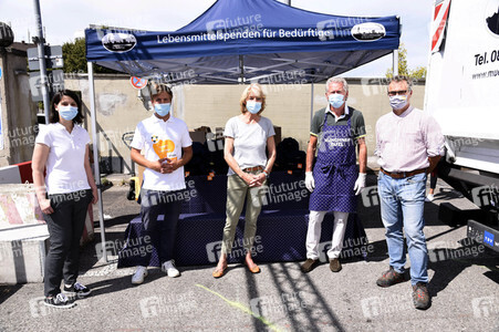 Spendenaktion mit Paul Breitner in München